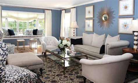 This large bedroom is divided into different spaces including the main bed with its fluffy silk sheets and headboard, the day bed and its simple brown color, and a bay window to the far end with a patterned window. Pin on Blue, blue interior, blue and white