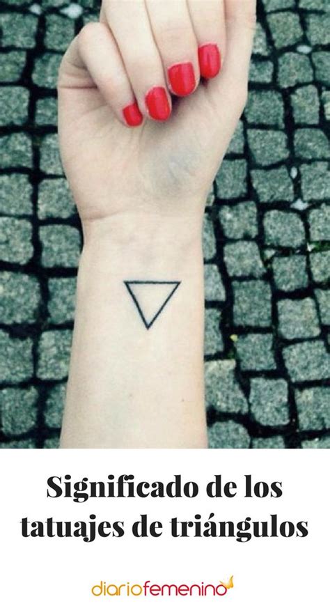 A Woman S Hand With A Small Triangle Tattoo On It And The Words Signific