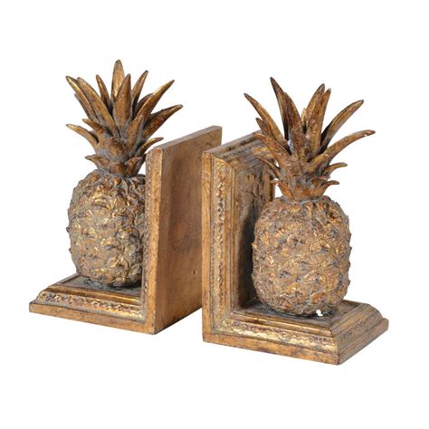 Two Pineapple Bookends By Out There Interiors