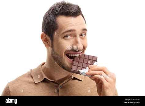 Man Biting Chocolate Hi Res Stock Photography And Images Alamy