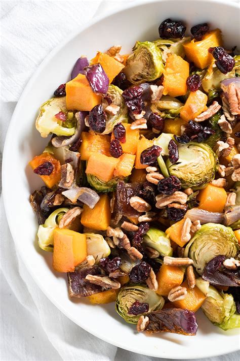 Don't let the christmas dinner sides play second fiddle this holiday season, these delicious, simple and festive recipes will most definitely be the star! Cranberry Pecan Roasted Vegetables - The Salty Marshmallow