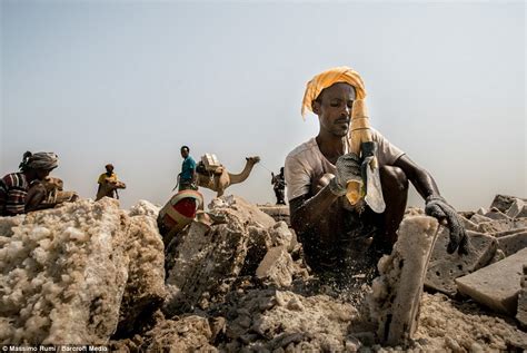 Massimo Rumi Photographs Ethiopians Digging For Salt In The Gateway To