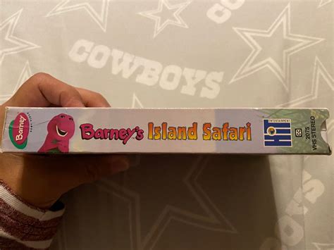 Someone Holding Up A Candy Bar With The Wordbunnies Island Safarion It