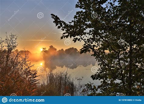 Early Morning Sunrise Over The Lake Stock Photo Image