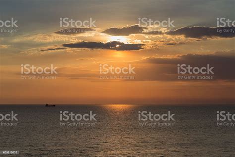 Ship On The Seacoast With Sunset Sky Background Natural Landscape Stock