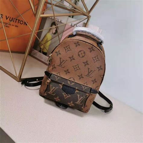 Brown and tan monogram coated canvas louis vuitton mini palm springs backpack with brass hardware, black leather accents, exterior zip pocket at front, black woven lining, single open pocket at interior wall and zip closure at top. Louis Vuitton LV Women Palm Springs Mini in Monogram ...