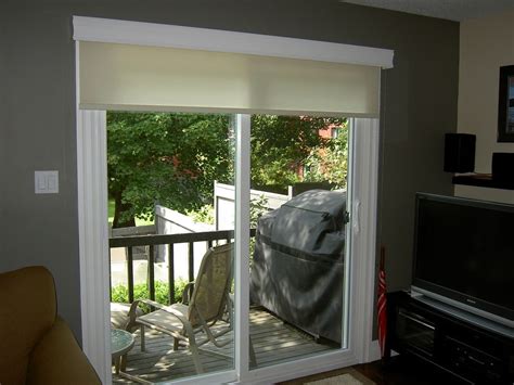 I did this with our french patio door curtains. Roller Shade on a patio door | Patio door coverings, Door ...