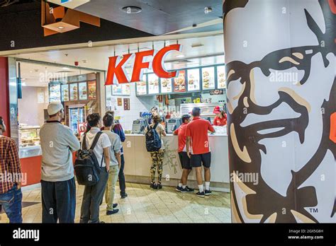 Kfc Fast Food Restaurant Customers Line Queue Colonel Sanders Hi Res Stock Photography And