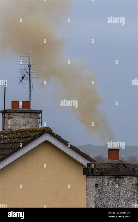 Smoke Rising From A House Chimney Hi Res Stock Photography And Images