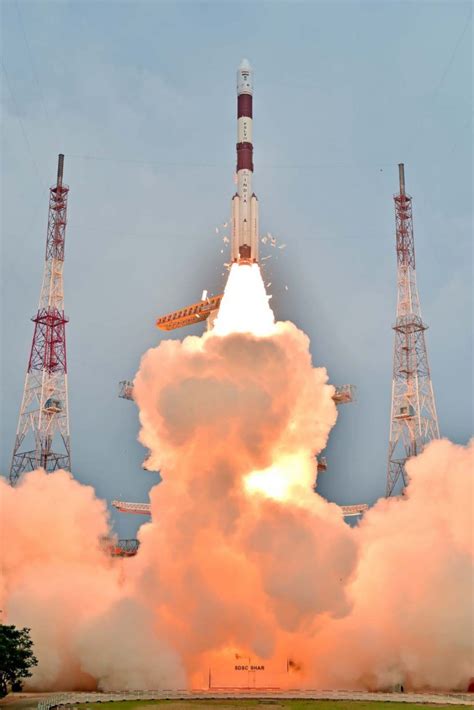 Photos Indias Pslv Rocket Lifts Off With Irnss Navigation Satellite