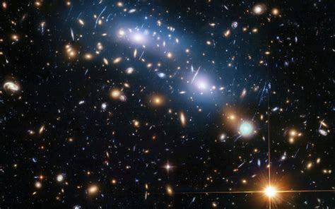 Peering deep into the early Universe, Hubble sought stars but found a mystery - SlashGear