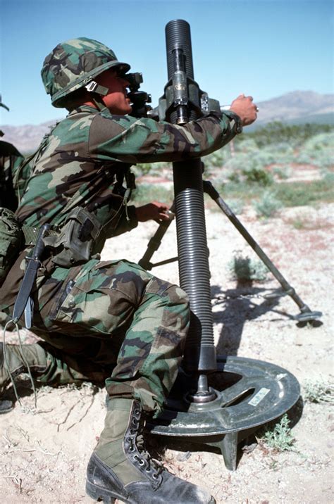 An Airman Sights In An M29 81 Mm Mortar During Exercise Crown Defender