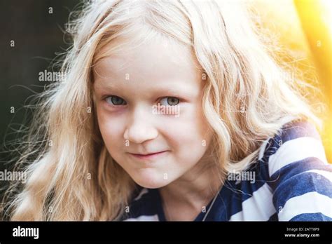 Portrait Of A Smiling Beautiful Little Blonde Girl Stock Photo Alamy
