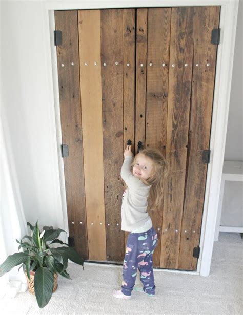 Closet rods are the part of your wardrobe that get the most wear and tear in the shortest time. DIY Reclaimed Wood Closet Doors - The Definery Co