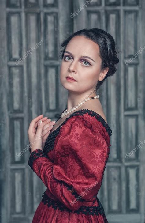 Beautiful Medieval Woman In Red Dress Stock Photo By ©darkbird 54916401