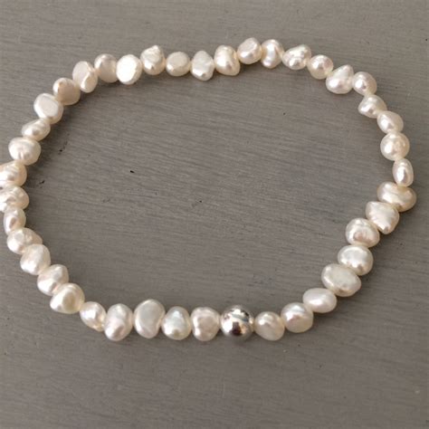 Tiny Freshwater Pearl Stretch Bracelet With A Sterling Silver Or 14ct