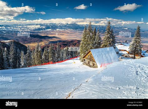 Fantastic Winter Landscape Wooden Chalets And Stunning Ski Slopes In
