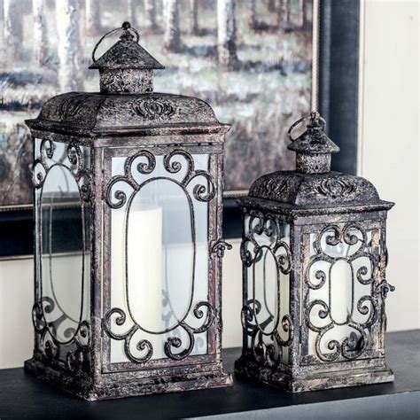 Tuck Pillar Candles Into These Chic Iron Lanterns To Cast A Flickering