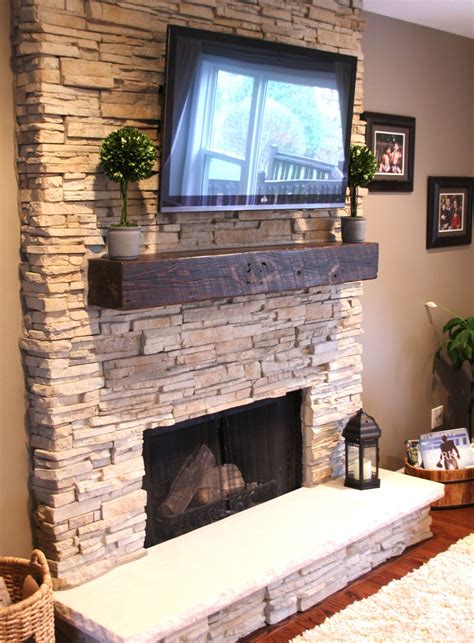 Rock Fireplace With Wood Mantel