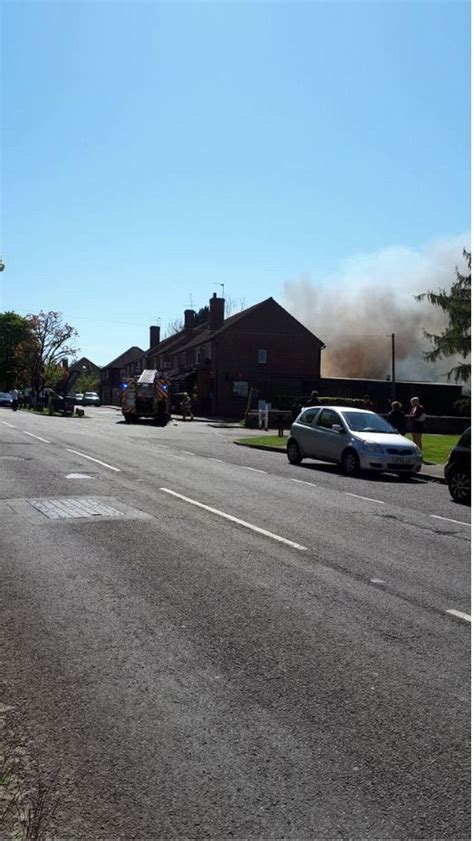 Smoke Billows Into The Air As Firefighters Tackle Serious Blaze In