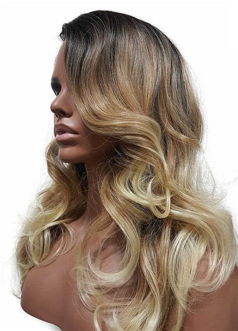 This cinnamon brown hair benefits from some copper and blonde highlighting, especially around the face and on. Brownie Blonde on loose curly hair. #sunkissedhair # ...