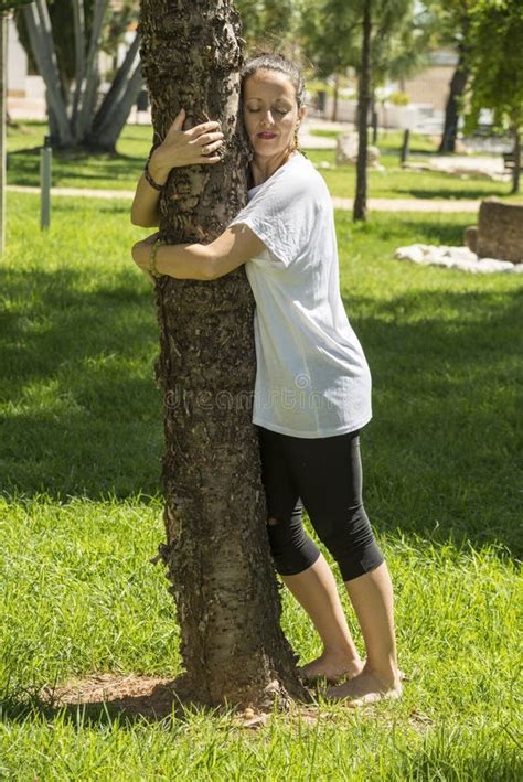 A Woman Hugging A Tree Stock Image Image Of People