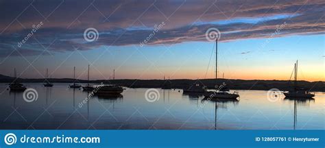 Sunset At Twilight Over Morro Bay Harbor Boats And Morro Rock On The