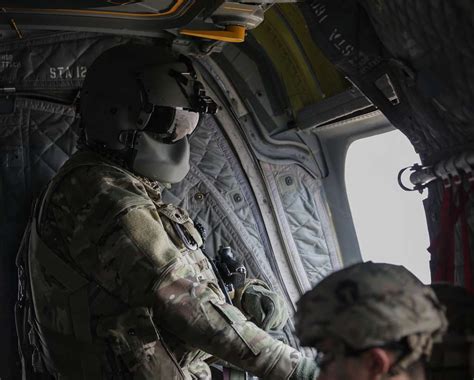 A Us Army Ch 47 Chinook Door Gunner Provides Security Nara And Dvids