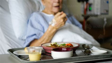 Image Of Female Patient Eating Hospital Food Austockphoto