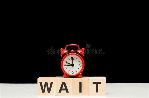 Wait Waiting Red Clock And Wooden Figures On Black Background Stock