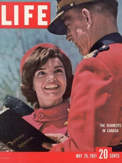 jacqueline kennedy chatting with canadian mounted policeman during visit with jfk may 26 1961