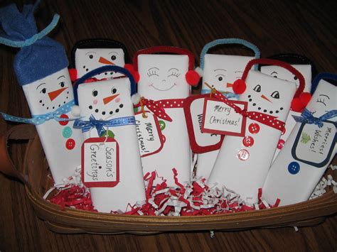 Hope everyone has a great time while santa is too distracted to notice if you've been because christmas, as they say, starts earlier every year. candy bar snowmen | Christmas, Merry christmas, Gift baskets