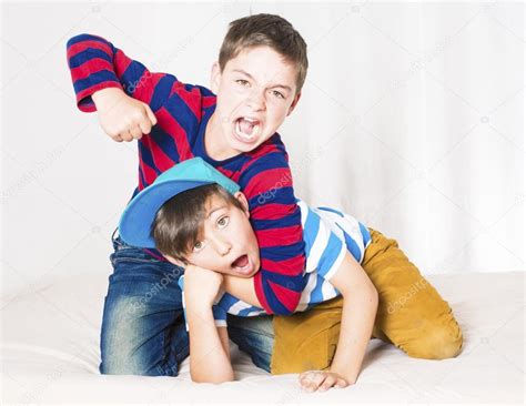 Two Boys Fighting — Stock Photo © Wernerimages 54484603