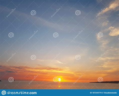 Natural Sunset Colorful Sky Ocean Wavesun Over Skyline Sea Water In