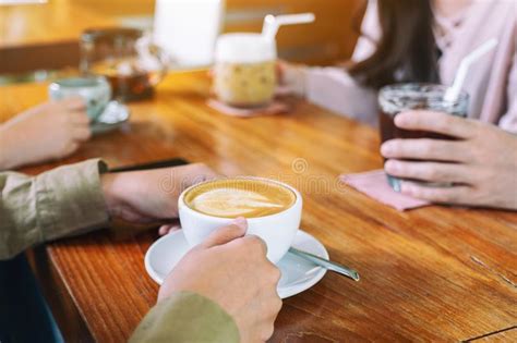 People Enjoyed Drinking Coffee Together In Cafe Stock Photo Image Of