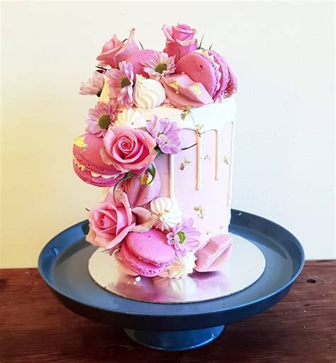 Pink Buttercream With White Drip Gold Leaf Fresh Flowers Macarons