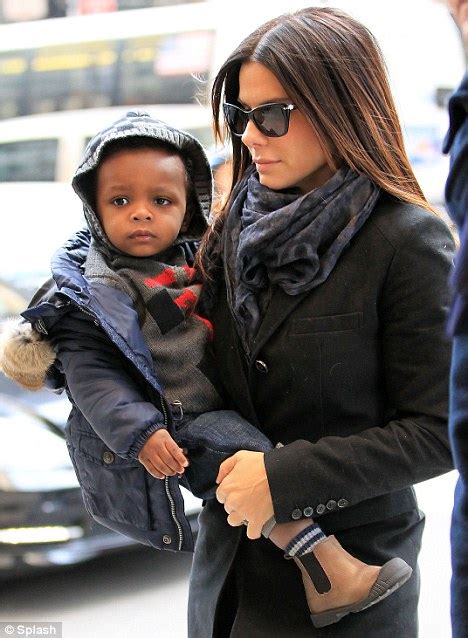 Little Man In The Big Apple Sandra Bullock Wraps Up Baby Louis For A