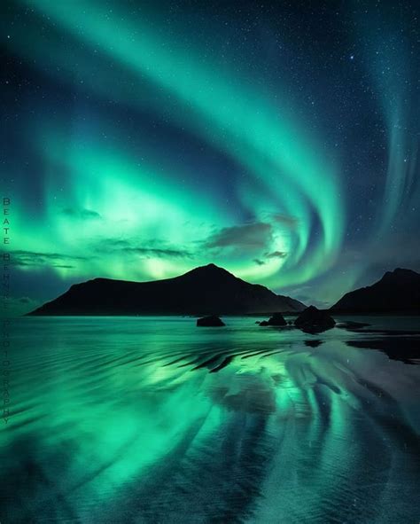 Amazing Aurora Borealis Above Skagsanden Beach Lofoten Norway By