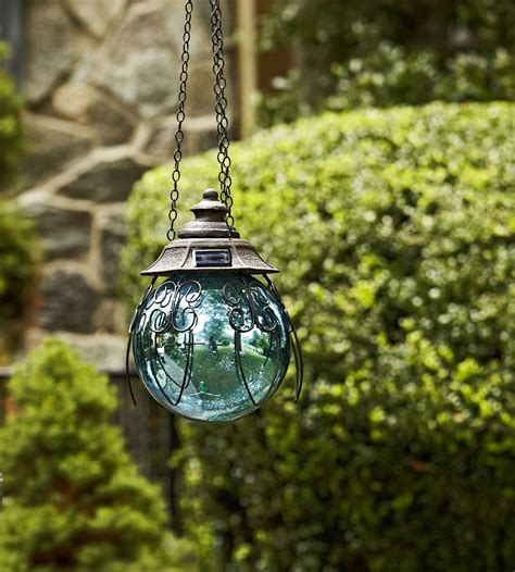 Globe solar hanging lanterns enhance any outdoor space with a string of soft led lights emanating through colored crackle glass. Garden Oasis 8in Solar Hanging Gazing Ball - Blue | Shop ...