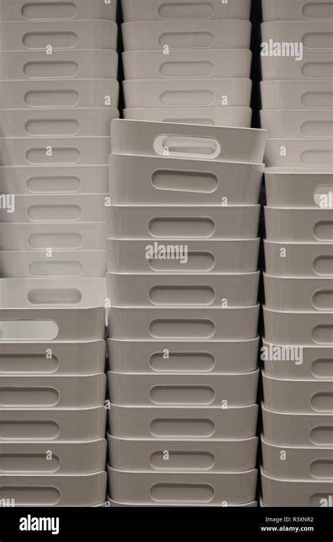 Stack Of White Plastic Storage Boxes With Handles Stock Photo Alamy