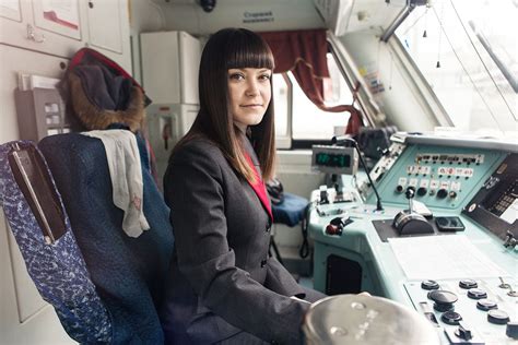 A Female Train Master Driving A High Speed Train In Moscow Speed