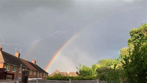 Astonishing Photos Capture Double Rainbow And Lightening As Storm Hits