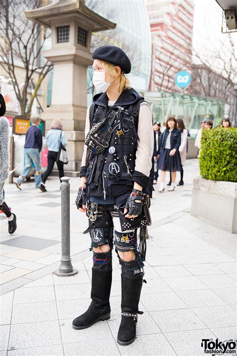 harajuku guy in patched punk fashion w beret and boots tokyo fashion
