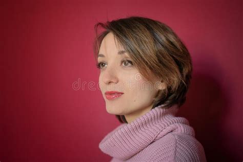 Close Up Portrait Of Young Emotional Woman With Short Hair Dressed In