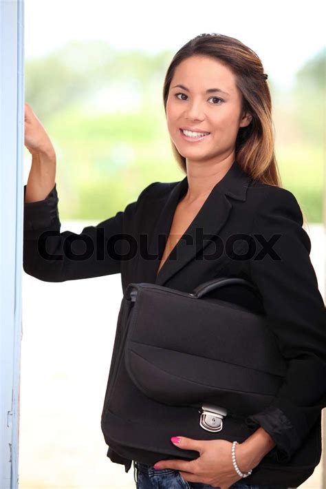 Woman Opening Her Front Door Stock Image Colourbox