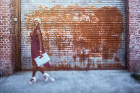 Stylish Woman Walking On The Street By Stocksy Contributor Vero