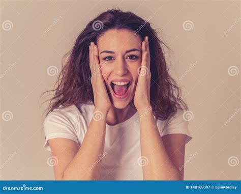 Happy Young Attractive Woman With Red Hair Shocked With A Surprised Face Human Expressions