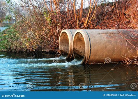 Discharge Of Sewage Into A River Stock Photo Image Of Danger Flow