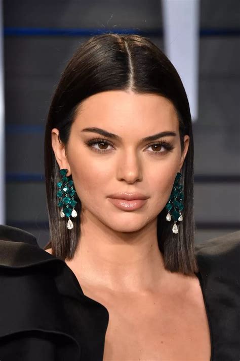 kendall jenner just dyed her hair red and it looks incredible slick straight hair jenner hair