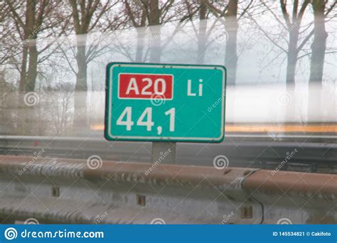 Distance Sign In Kilometers At Motorway A20 At 441 Kilometer On Left